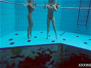 steamy Russian nymphs swimming in the pool